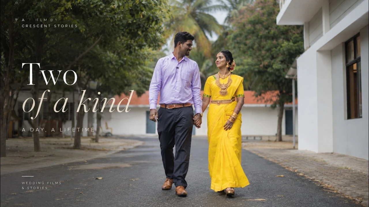 Couple walking hand in hand outside, with the film title Two of a Kind